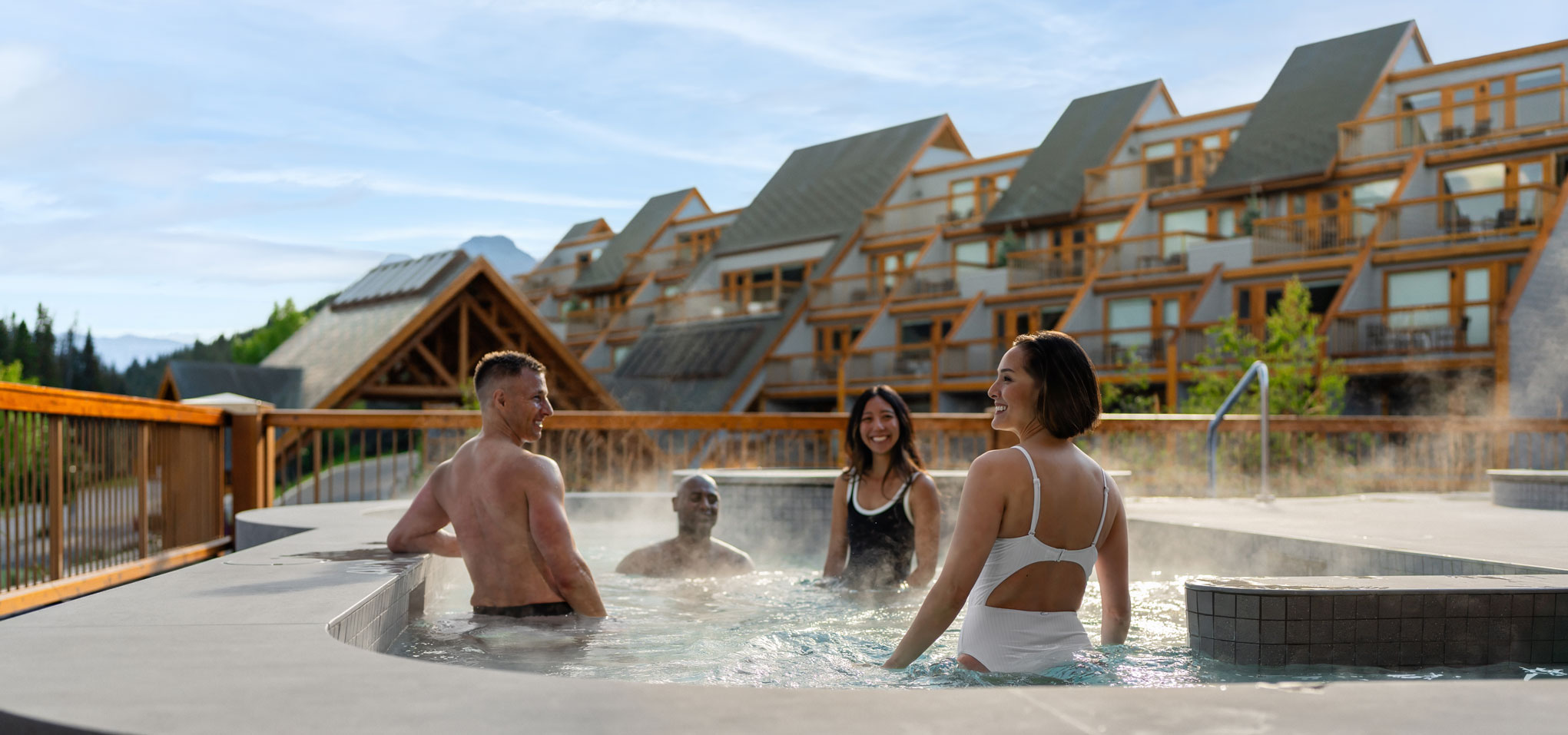 Group enjoying hot pools at otter hotel banff